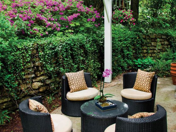A patio set provides a comfortable perch for parent supervision