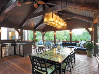 Furniture adds pops of color to an outdoor dining space