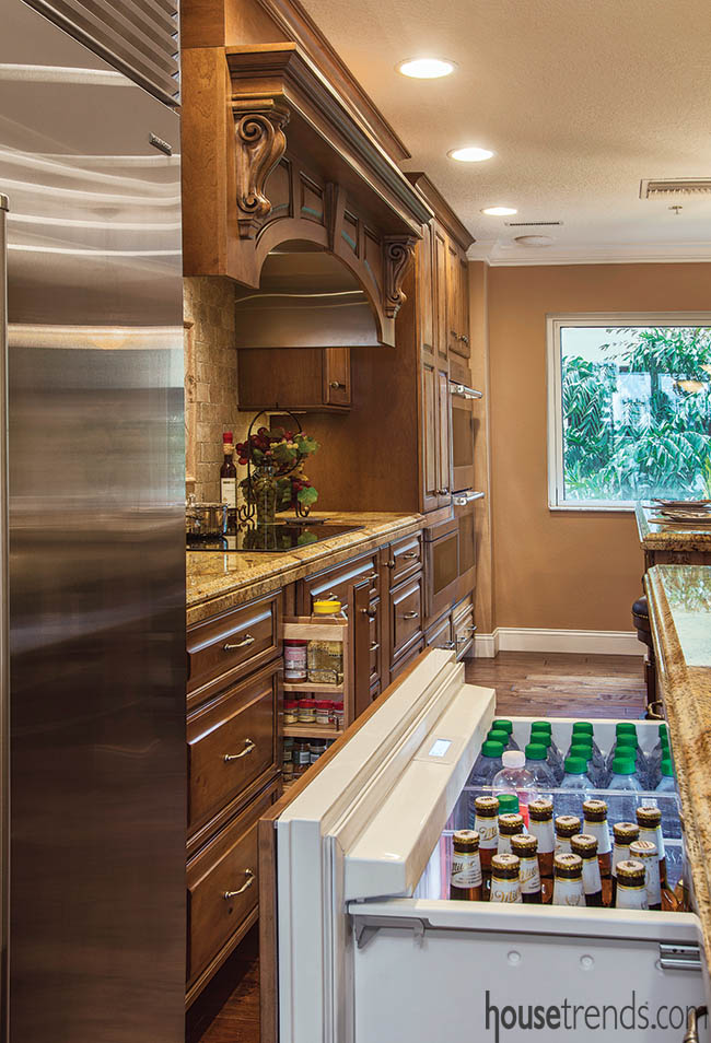 Kitchen cabinetry hides convenient storage options