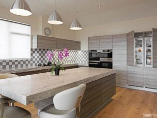 Kitchens feature sleek looks and hidden appliances