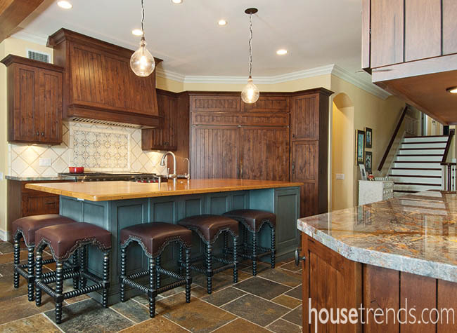 Cabinet panels hide Sub-Zero refrigerator