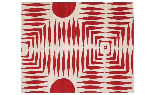 Red rug with a symmetrical pattern