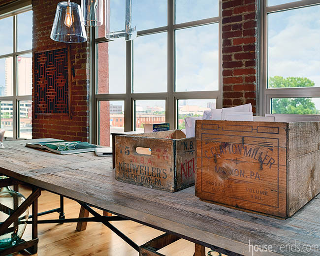 Natural light shines on a rustic work table