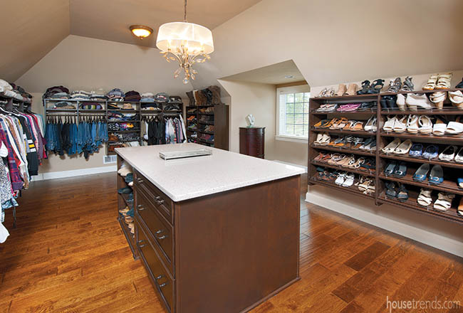 Chandelier softens a walk-in closet