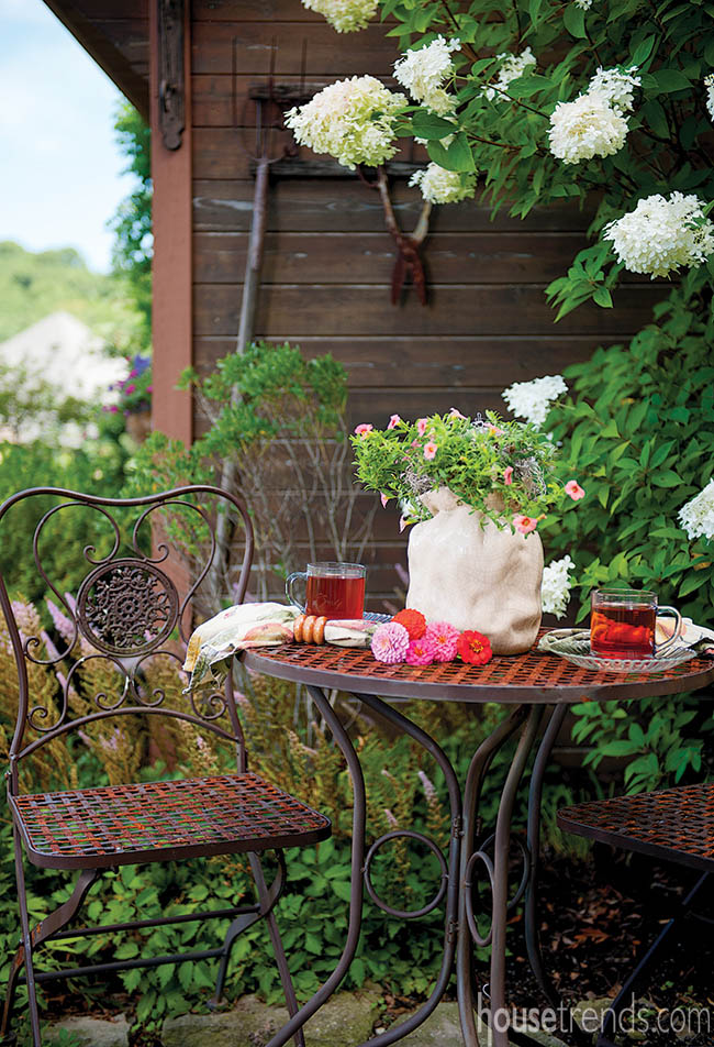 Patio table beckons owner to relax