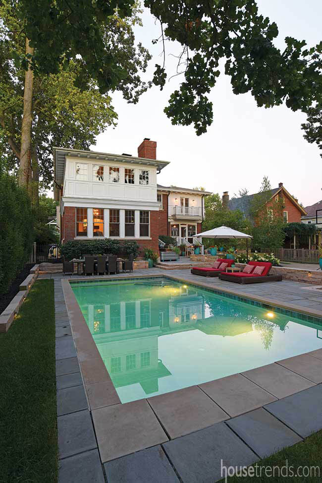 Swimming pool dominates a remodeled back yard