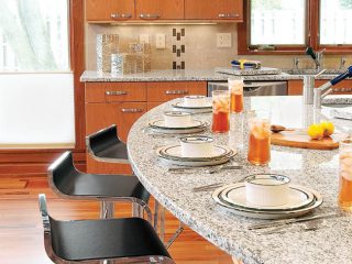 Barstools add seats without cluttering a kitchen