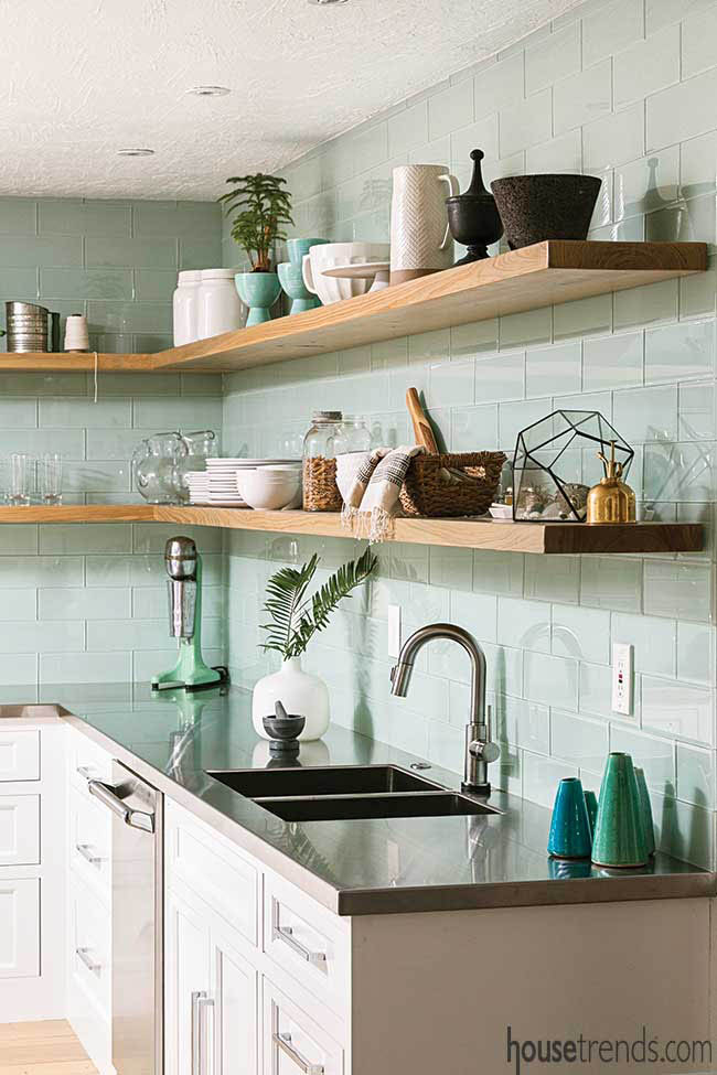 Kitchen backsplash stretches all the way up to ceiling