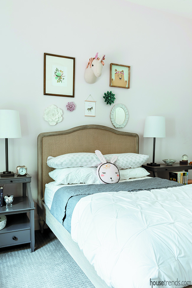 Cozy bedroom design includes a fabric headboard