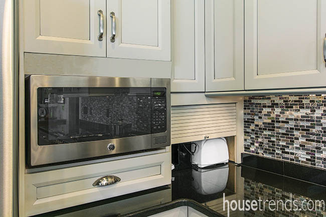 Cabinetry tucks away appliances