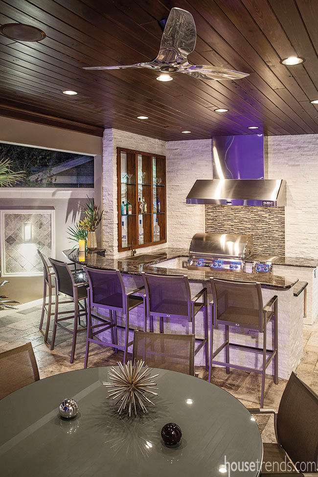 LED lighting adds color to an outdoor kitchen