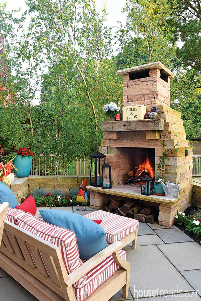 Cozy furniture in front of an outdoor fireplace