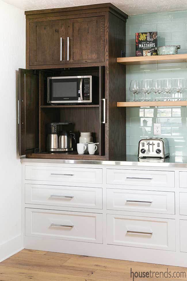 Retractable doors hide kitchen appliances