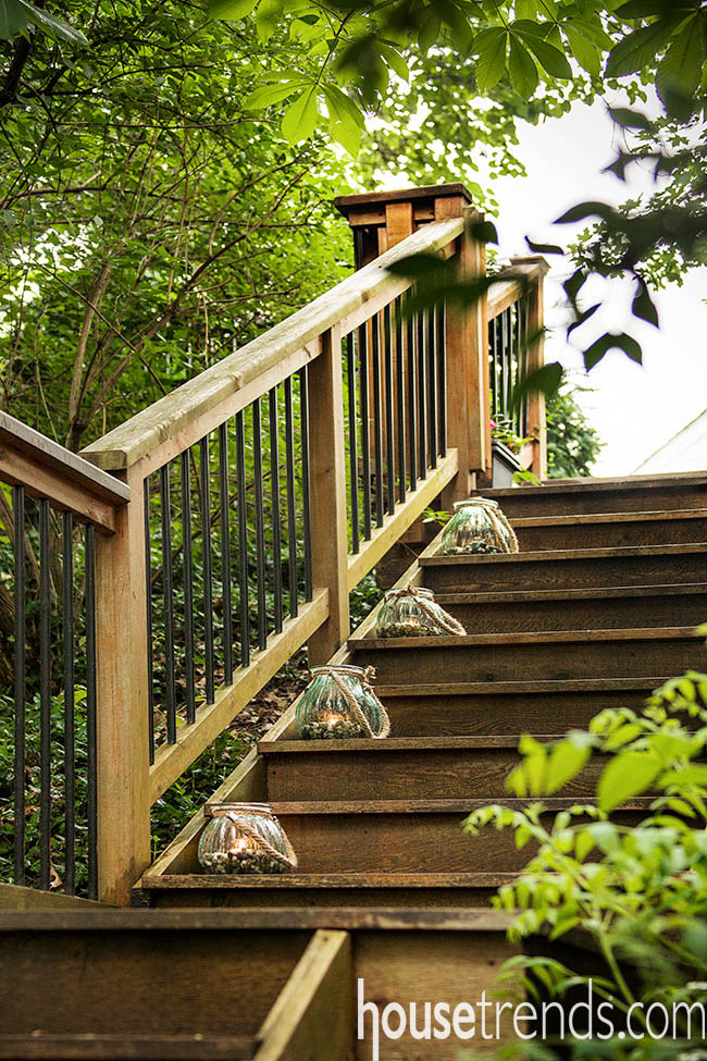 Candles light up a landscape design