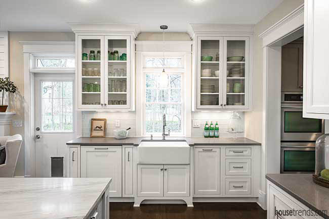 Kitchen appliances hidden by cabinetry