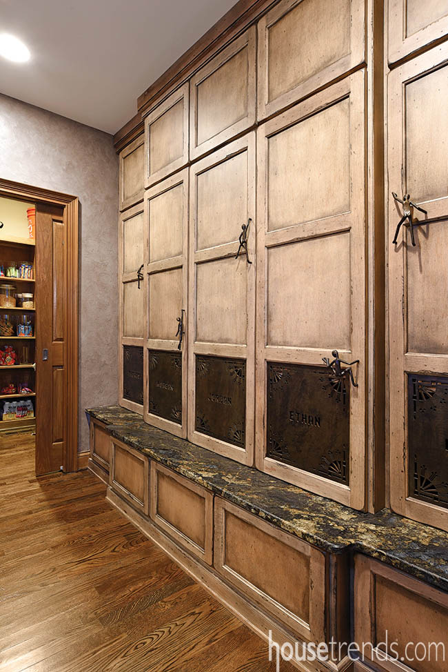 Granite bench helps transition a kitchen to a mudroom