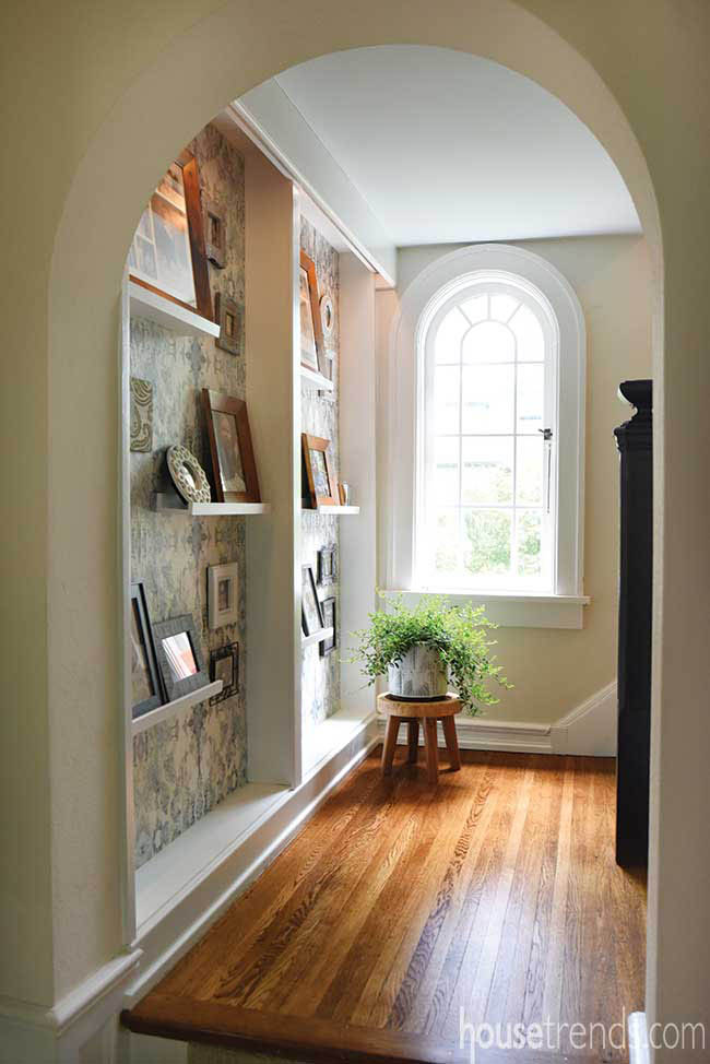 Pictures displayed on staircase landing