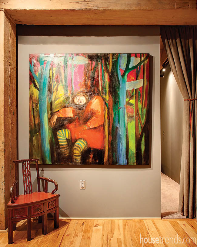 Colorful wall art adorns an entry