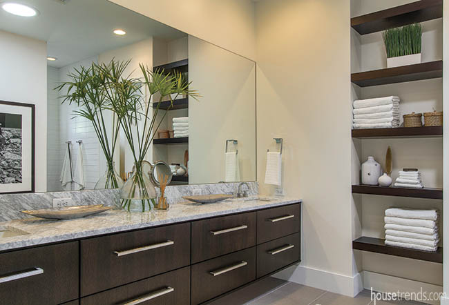 Floating shelves complement nearby double vanity