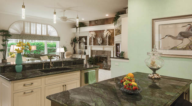 Modern living room design opens into the kitchen