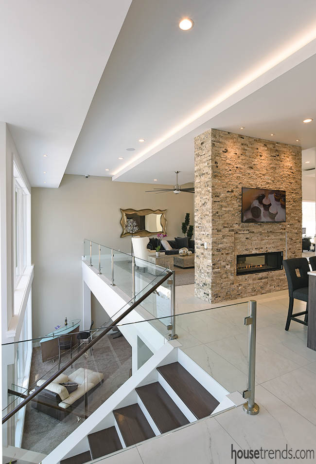 Glass railing offers glimpse of a lower level
