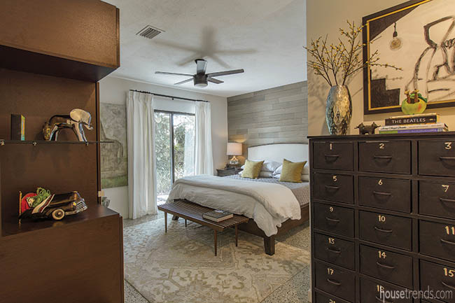 Area rug softens a master bedroom