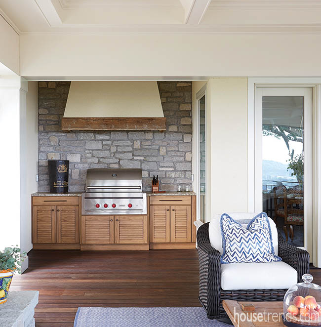 Custom range hood in an outdoor kitchen