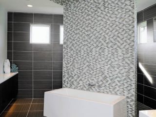 Master bathroom embraces a bold design