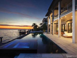 Outdoor lighting spotlights a back yard