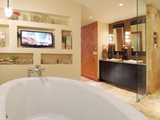 Large bath tub creates a soothing master bath retreat