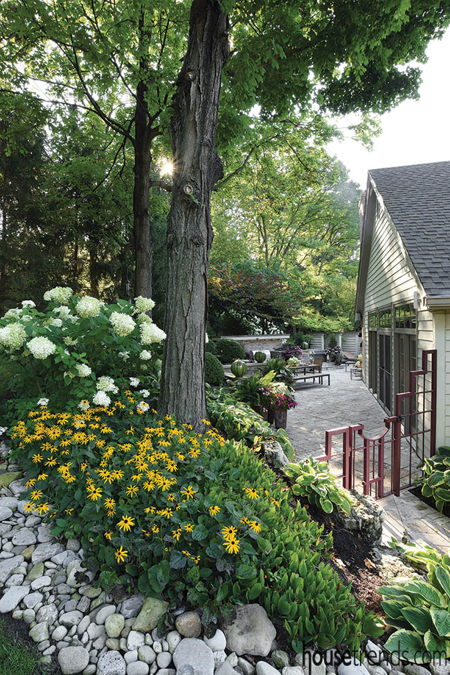 Landscape renovation makes way for a large patio