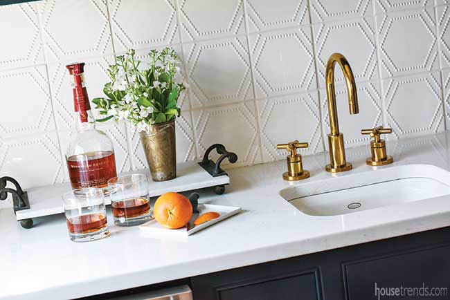 Textured backsplash for a bar area
