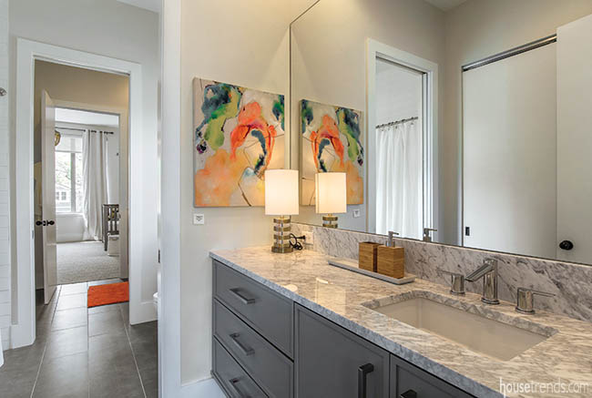 Marble countertops complement a contemporary bathroom
