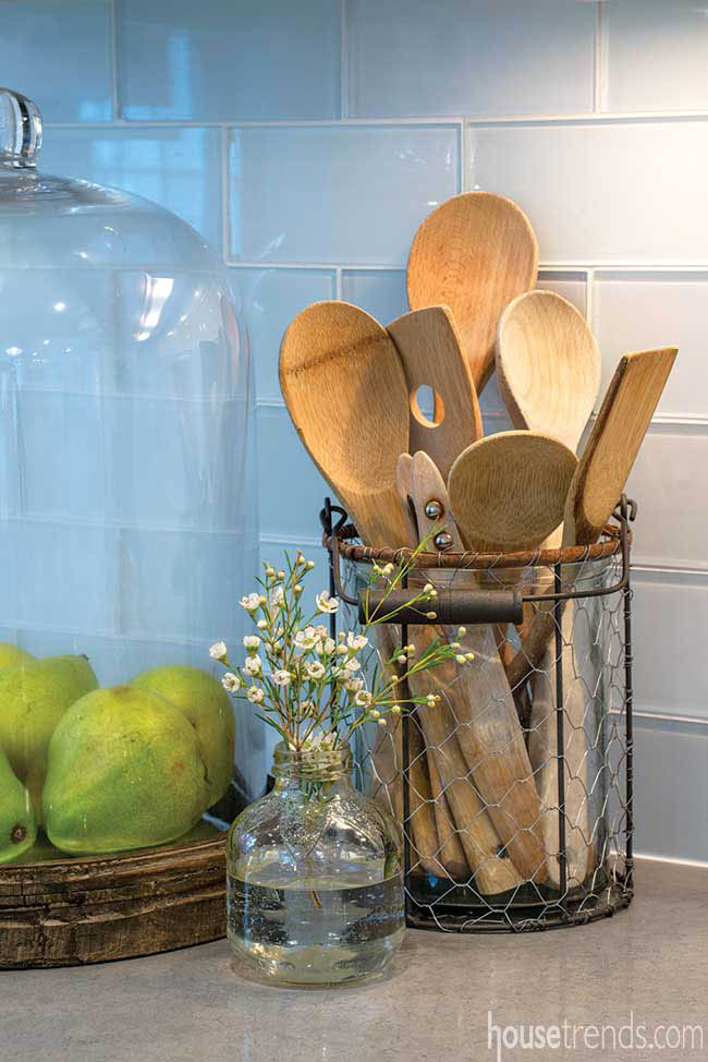 Glass subway tiles create a timeless backsplash