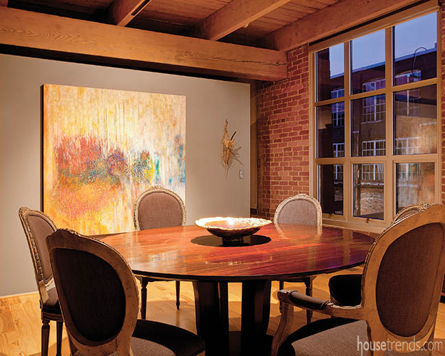 Wall art adds color to a dining room