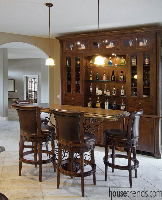 Kitchen design flows into a bar area