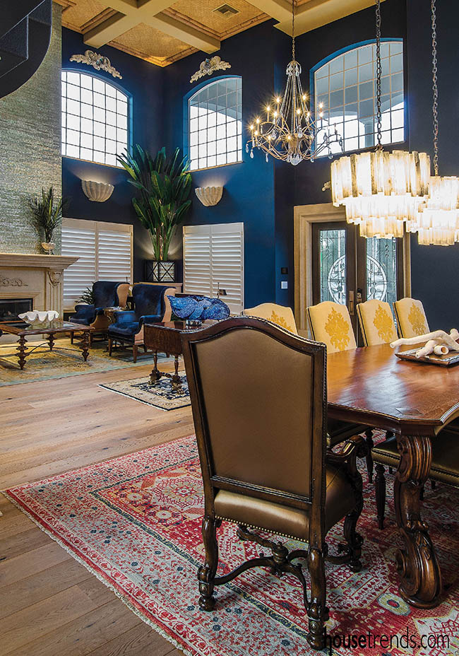 Chandeliers spotlight a dining room table