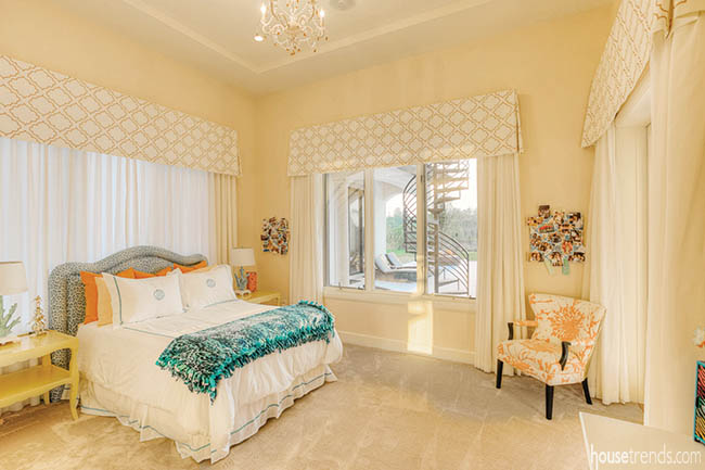 Fun colors pop in a girls bedroom design