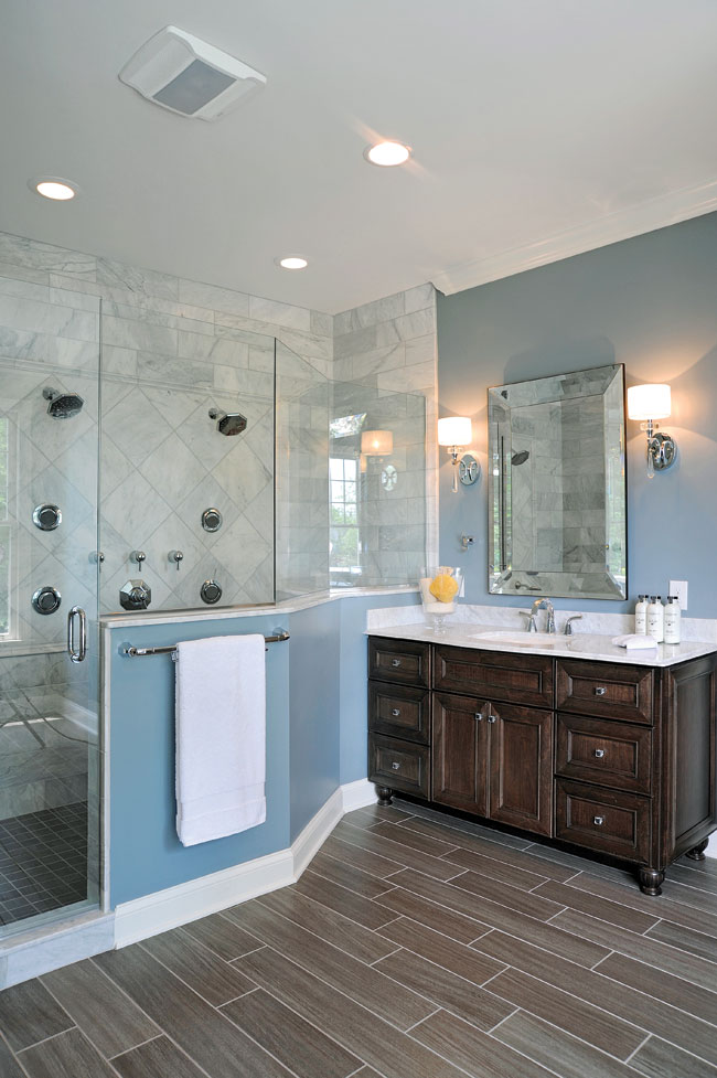 Shower glass allows the Venatino Marble to be visible all the time.