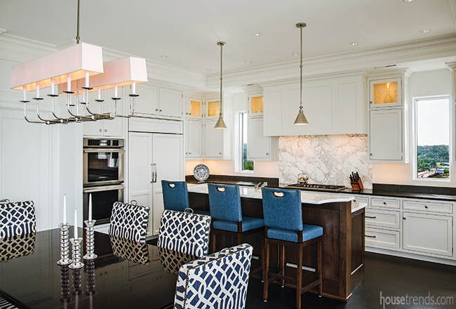 Dramtic light fixture adds definition to a condo