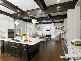 Ceiling beams complement the kitchen island