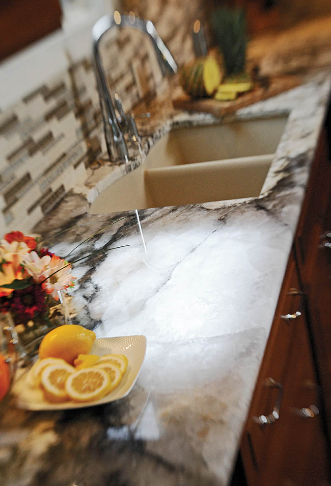 Kitchen sink features unique materials