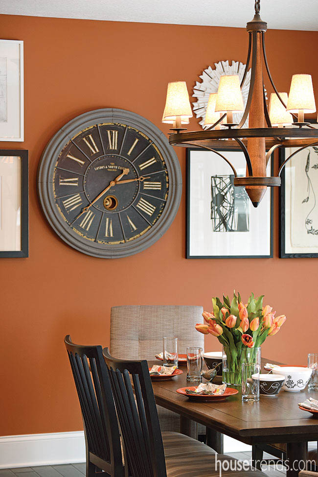 Collage of art adds interest to a breakfast room