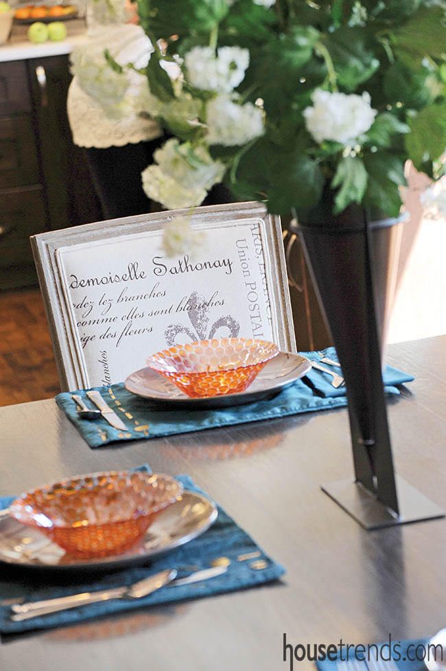 Table settings complement a kitchen's colors