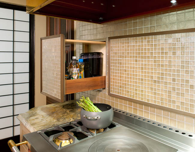 Kitchen backsplash hides storage space
