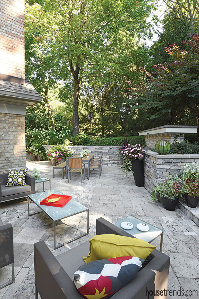 Outdoor furniture adds color to a private sitting area