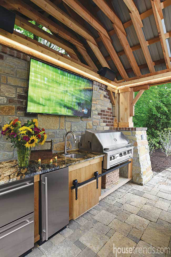 Outdoor kitchen with indoor conveniences