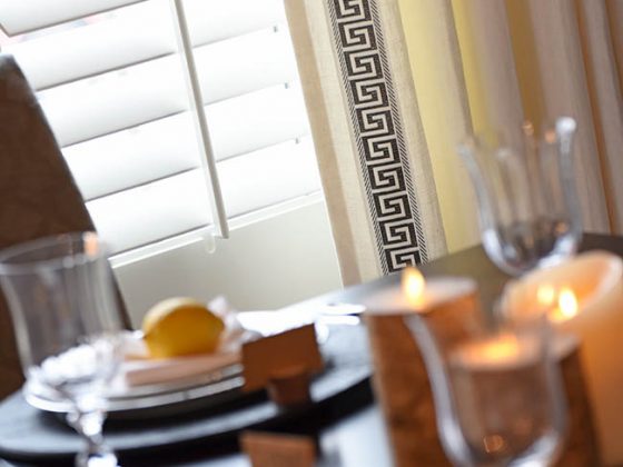 Window treatments boast a Greek key pattern