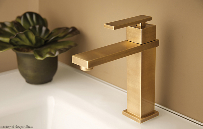 Antique brass finish complements a bathroom faucet