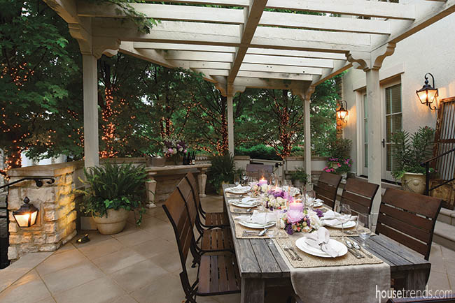 Pergola shades an outdoor dining area